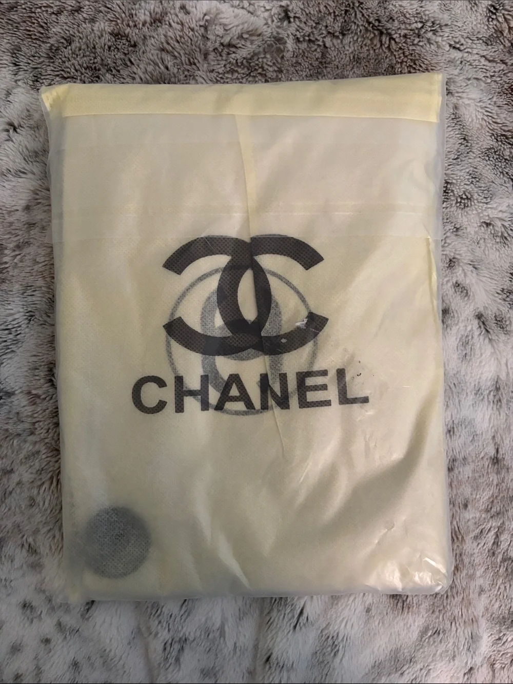 CHANEL White Quilted Cosmetic Pouch with Black Logo